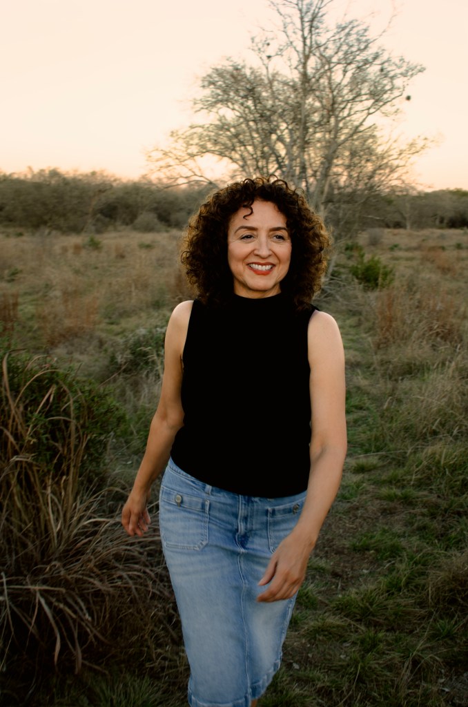 Lanae walking through the tree line 